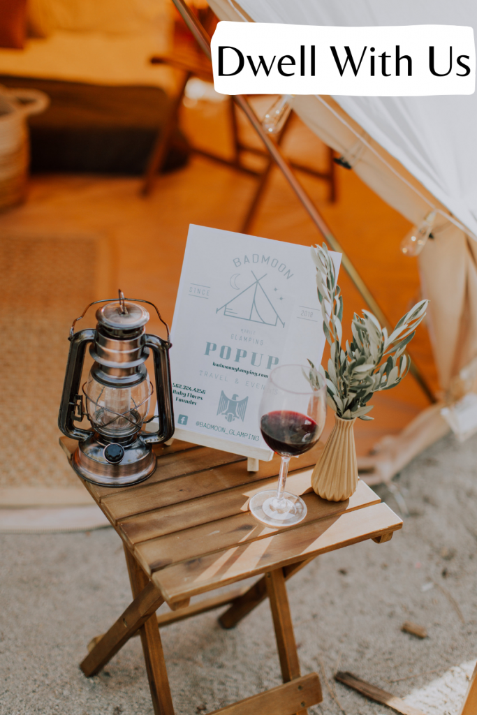 tent and wine in the woods